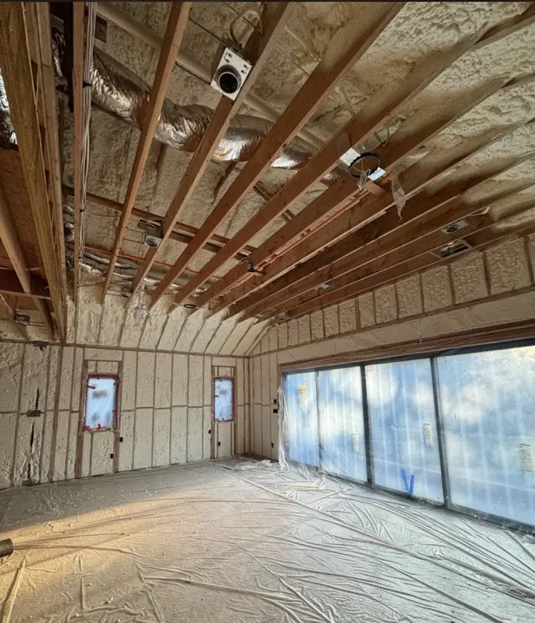 Interior walls and ceiling insulated with spray foam during new construction in Port Lavaca